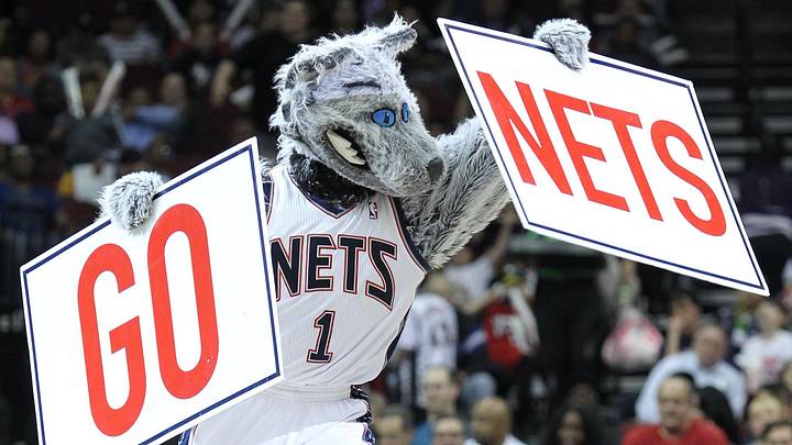 Apr 11; Newark, NJ, USA; The New Jersey Nets mascot, Sly Fox, leads fans in a cheer during the second half at the Prudential Center. The Bobcats defeated the Nets 105-103. Mandatory Credit: Ed Mulholland-Imagn Images Apr 11; Newark, NJ, USA; The New Jersey Nets mascot, Sly Fox, leads fans in a cheer during the second half at the Prudential Center. The Bobcats defeated the Nets 105-103. Mandatory Credit: Ed Mulholland-Imagn Images