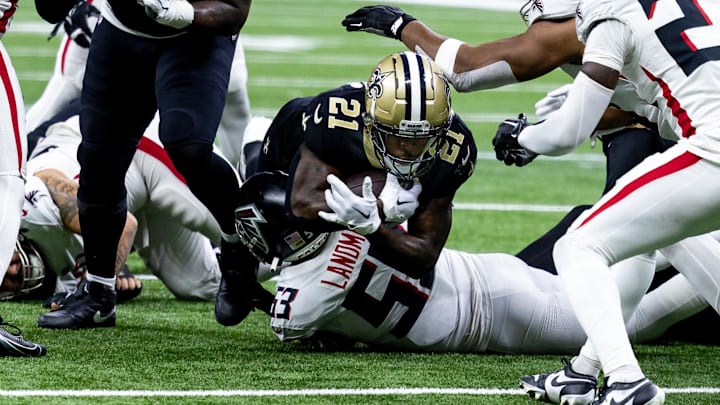 Jan 7, 2024; New Orleans, Louisiana, USA; Atlanta Falcons linebacker Nate Landman (53) tackles New Orleans Saints running back Jamaal Williams (21) during the second half at Caesars Superdome. Mandatory Credit: Stephen Lew-Imagn Images Jan 7, 2024; New Orleans, Louisiana, USA; Atlanta Falcons linebacker Nate Landman (53) tackles New Orleans Saints running back Jamaal Williams (21) during the second half at Caesars Superdome. Mandatory Credit: Stephen Lew-Imagn Images