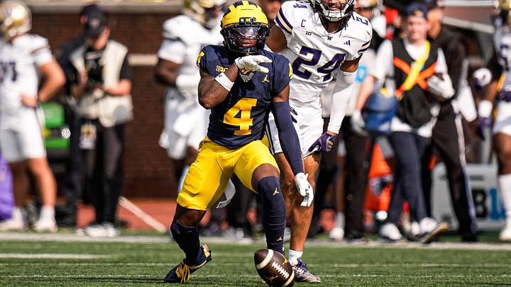 Michigan wide receiver Andrew Marsh celebrates a first down against Washington