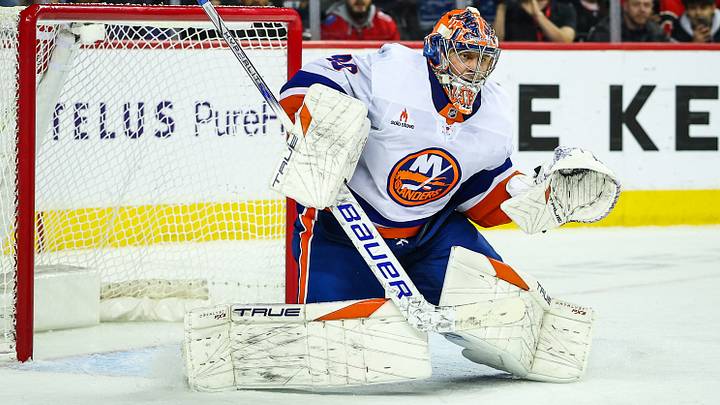 Nov 19, 2024; Calgary, Alberta, CAN; New York Islanders goaltender Semyon Varlamov (40) guards his net against the Calgary Flames during the overtime period at Scotiabank Saddledome. Mandatory Credit: Sergei Belski-Imagn Images