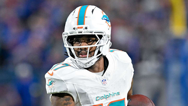Miami Dolphins wide receiver Jaylen Waddle (17) carries the ball after making a catch against the Buffalo Bills in the fourth quarter at Highmark Stadium. 