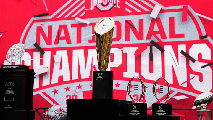 The championship trophies sit on the stage during the Ohio State Buckeyes College Football Playoff National Championship celebration at Ohio Stadium in Columbus on Jan. 26, 2025. The championship trophies sit on the stage during the Ohio State Buckeyes College Football Playoff National Championship celebration at Ohio Stadium in Columbus on Jan. 26, 2025.