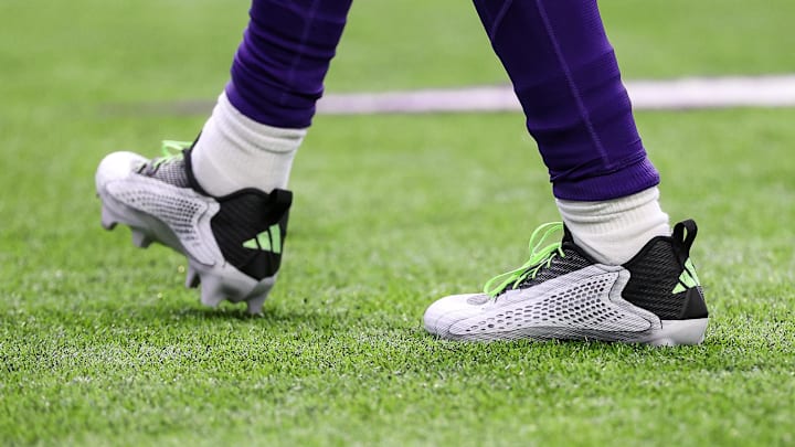 Minnesota Vikings wide receiver Jordan Addison wears custom adidas Anthony Edwards cleats.