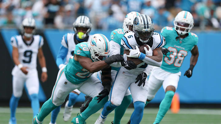Carolina Panthers running back Rico Dowdle (5) carries the ball during the second quarter against the Miami Dolphins at Bank of America Stadium. Carolina Panthers running back Rico Dowdle (5) carries the ball during the second quarter against the Miami Dolphins at Bank of America Stadium.