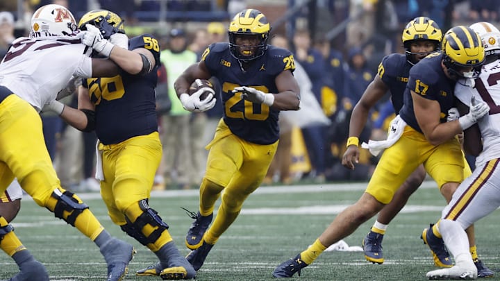 Sep 28, 2024; Ann Arbor, Michigan, USA;  Michigan Wolverines running back Kalel Mullings (20) rushes in the second half against the Minnesota Golden Gophers at Michigan Stadium.