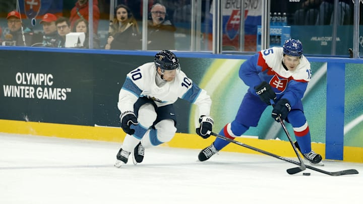 Feb 11, 2026; Milan, Italy; Dalibor Dvorsky of Slovakia in action with Henri Jokiharju of Finland in men's ice hockey group B play during the Milano Cortina 2026 Olympic Winter Games at Milano Santagiulia Ice Hockey Arena. Mandatory Credit: Geoff Burke-Imagn Images Feb 11, 2026; Milan, Italy; Dalibor Dvorsky of Slovakia in action with Henri Jokiharju of Finland in men's ice hockey group B play during the Milano Cortina 2026 Olympic Winter Games at Milano Santagiulia Ice Hockey Arena. Mandatory Credit: Geoff Burke-Imagn Images