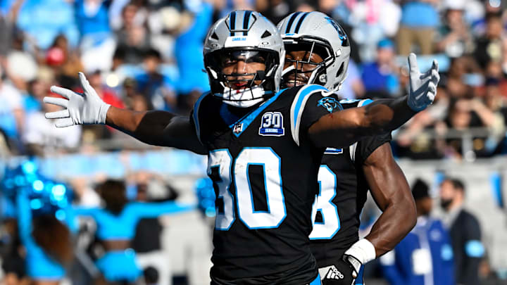 Nov 3, 2024; Charlotte, North Carolina, USA; Carolina Panthers running back Chuba Hubbard (30) celebrates touchdown in the third qarter at Bank of America Stadium. Mandatory Credit: Bob Donnan-Imagn Images