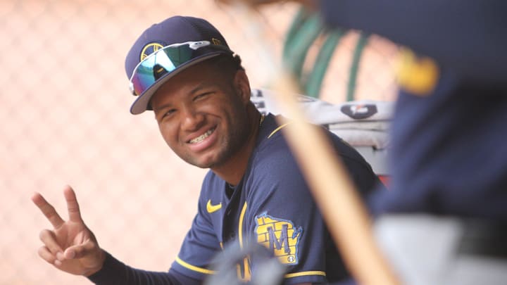 Milwaukee Brewers prospect Jackson Chourio smiles for a photo during minor league workouts at