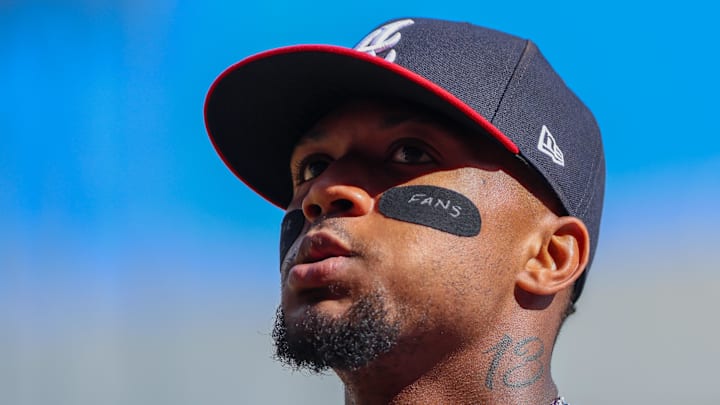 Cumberland, Georgia, USA; Atlanta Braves outfielder Ronald Acuna Jr. (13) walks to the dugout during the game against the Pittsburgh Pirates during the third inning at Truist Park.