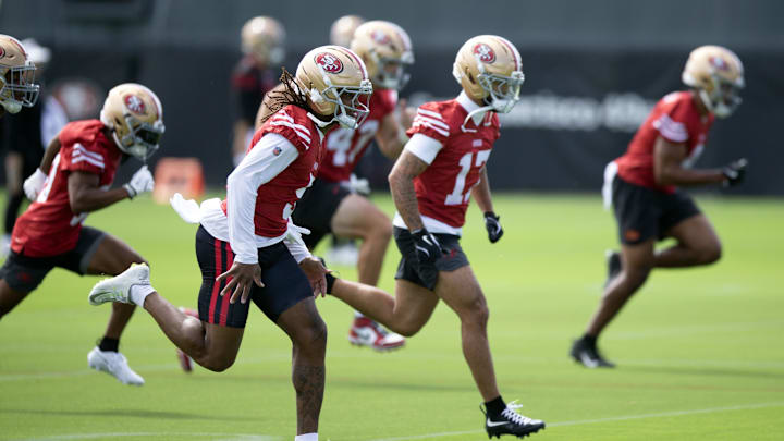 Jul 23, 2025; Santa Clara, CA, USA; San Francisco 49ers offensive backs and receivers run wind sprints during the first day of training camp at SAP Performance Facility. Mandatory Credit: D. Ross Cameron-Imagn Images