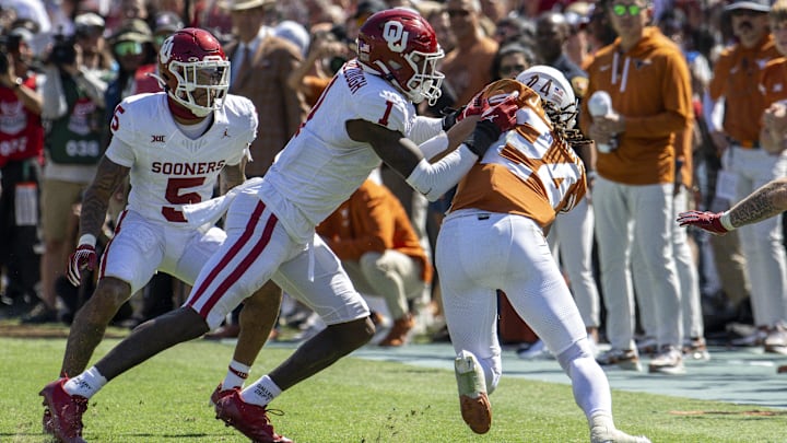 Oct 7, 2023; Dallas, Texas, USA; Oklahoma Sooners linebacker Dasan McCullough (1) and Texas Longhorns running back Jonathon Brooks (24) in action during the game between the Texas Longhorns and the Oklahoma Sooners at the Cotton Bowl. 