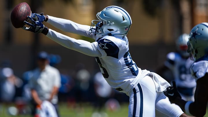 Dallas Cowboys wide receiver Jalen Brooks (83) reaches for the ball during training camp at Marriott Residence Inn-River Ridge playing fields.