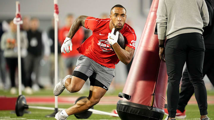 Ohio State Buckeyes running back TreVeyon Henderson works out during the pro day for NFL scouts. Ohio State Buckeyes running back TreVeyon Henderson works out during the pro day for NFL scouts.