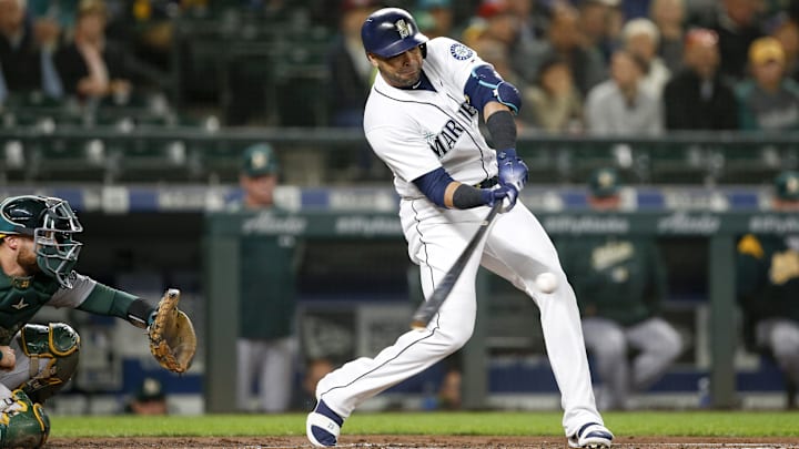 Seattle Mariners designated hitter Nelson Cruz hits a home run against the Oakland Athletics on Sept. 25, 2018, at Safeco Field.