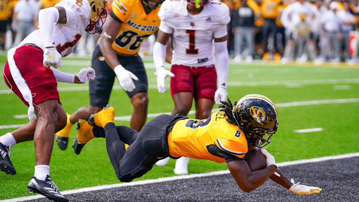 Mizzou running back, Nate Noel (8), punches in his second touchdown of the season in an afternoon game against Boston College.