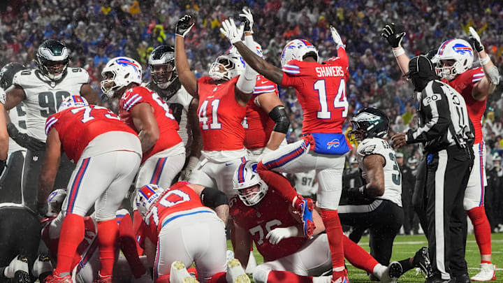Dec 28, 2025; Orchard Park, New York, USA; Buffalo Bills fullback Reggie Gilliam (41) reacts to a two-yard rushing touchdown scored by quarterback Josh Allen (not pictured) against the Philadelphia Eagles during the fourth quarter at Highmark Stadium.