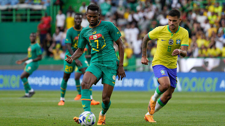 Mouhamadou Habibou Diallo from Senegal (L) and Bruno... Mouhamadou Habibou Diallo from Senegal (L) and Bruno...