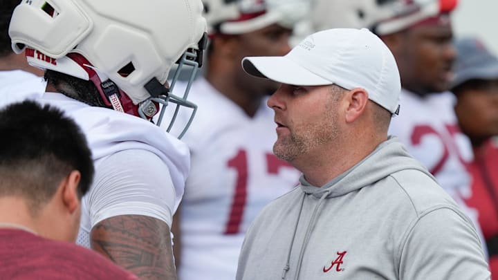 July 30, 2025; Tuscaloosa, AL, USA; Defensive coordinator Kane Wommack talks to defensive lineman London Simmons during the first practice session of the preseason for the Alabama Crimson Tide. July 30, 2025; Tuscaloosa, AL, USA; Defensive coordinator Kane Wommack talks to defensive lineman London Simmons during the first practice session of the preseason for the Alabama Crimson Tide.