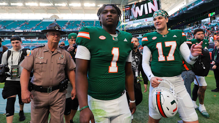 Nov 23, 2024; Miami Gardens, Florida, USA; Miami Hurricanes quarterback Cam Ward (1) looks on from the field after the game against the Wake Forest Demon Deacons at Hard Rock Stadium. Mandatory Credit: Sam Navarro-Imagn Images Nov 23, 2024; Miami Gardens, Florida, USA; Miami Hurricanes quarterback Cam Ward (1) looks on from the field after the game against the Wake Forest Demon Deacons at Hard Rock Stadium. Mandatory Credit: Sam Navarro-Imagn Images