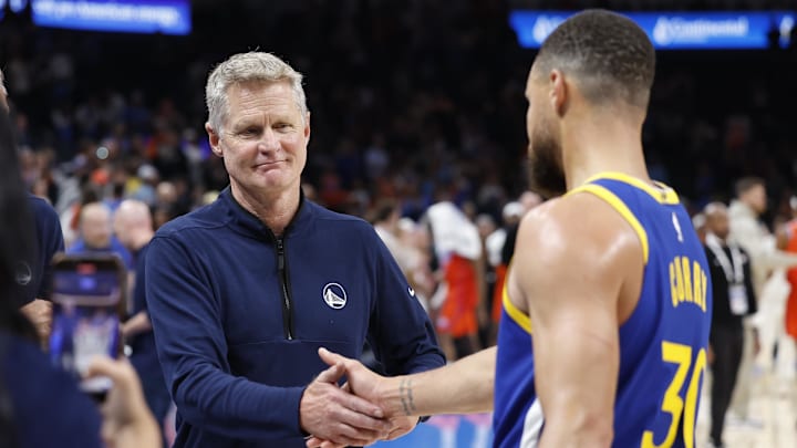Nov 10, 2024; Oklahoma City, Oklahoma, USA; Golden State Warriors head coach Steve Kerr celebrates with guard Stephen Curry (30) after their team defeated the Oklahoma City Thunder at Paycom Center. Mandatory Credit: Alonzo Adams-Imagn Images