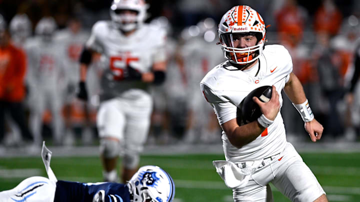 Celina quarterback Bowe Bentley scrambles with the ball during the Bobcats’ Class 4A Div. I semi-final game against West Plains in Abilene Dec. 13, 2024. Final score was 43-36, Celina.