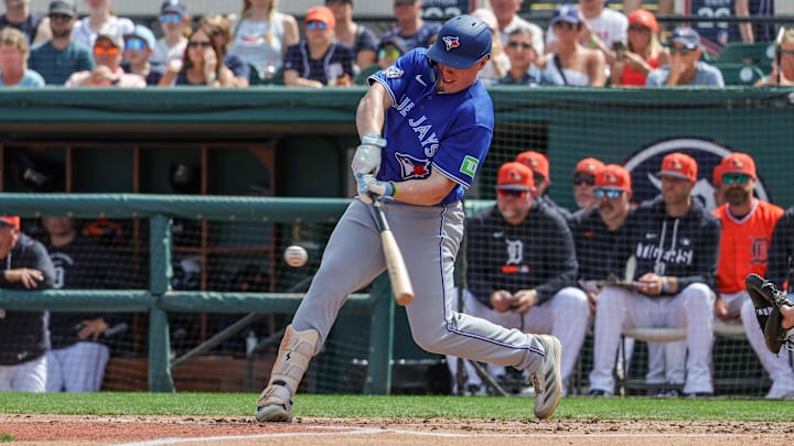 Mar 1, 2026; Lakeland, Florida, USA; Toronto Blue Jays first baseman Sean Keys (89) hits a double during the third inning against the Detroit Tigers at Publix Field at Joker Marchant Stadium. Mandatory Credit: Mike Watters-Imagn Images