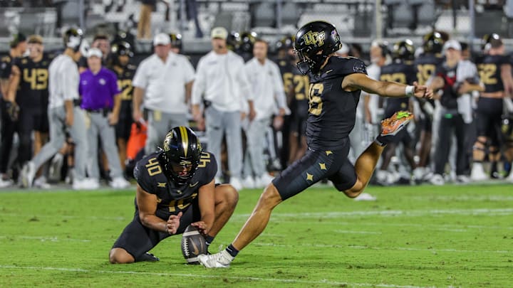 Oct 4, 2025; Orlando, Florida, USA; UCF Knights kicker Noe Ruelas (16) kicks the extra point during the first quarter against the Kansas Jayhawks at the Acrisure Bounce House. Mandatory Credit: Mike Watters-Imagn Images Oct 4, 2025; Orlando, Florida, USA; UCF Knights kicker Noe Ruelas (16) kicks the extra point during the first quarter against the Kansas Jayhawks at the Acrisure Bounce House. Mandatory Credit: Mike Watters-Imagn Images