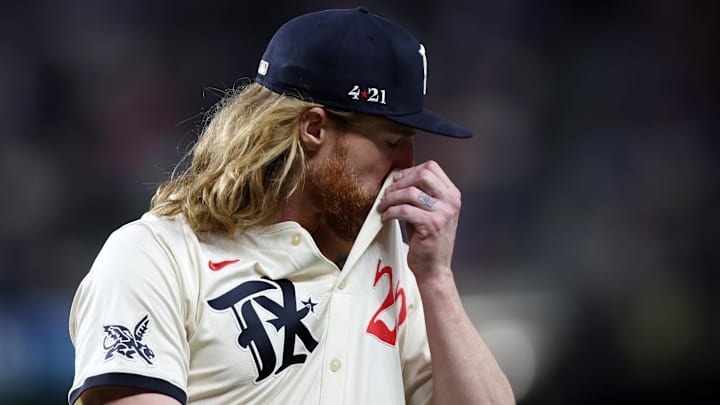 Aug 30, 2024; Arlington, Texas, USA; Texas Rangers pitcher Jon Gray (22) walks off the mound after the third inning against the Oakland Athletics at Globe Life Field. 