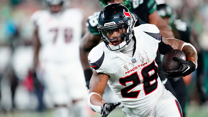 Houston Texans running back Joe Mixon (28) is shown with the ball during the first quarter, Thursday, October 31, 2024, in East Rutherford.