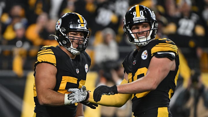 Oct 28, 2024; Pittsburgh, Pennsylvania, USA; Pittsburgh Steelers linebacker Alex Highsmith (56) celebrates with  T.J. Watt (90) after sacking New York Giants quarterback Daniel Jones (8) during the third quarter at Acrisure Stadium. Mandatory Credit: Barry Reeger-Imagn Images