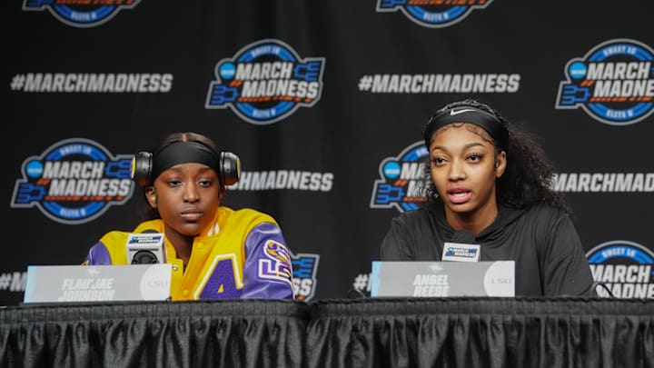 Mar 28, 2024; Albany, NY, USA; LSU Tigers guard Flau'jae Johnson (4) and forward Angel Reese (10) answer questions during the press conference to their NCAA Tournament Sweet 16 game at MVP Arena. Mandatory Credit: Gregory Fisher-Imagn Images