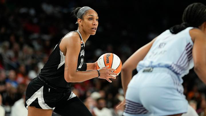 Aug 28, 2026; Las Vegas, Nevada, USA;  Las Vegas Aces center A'ja Wilson (22) controls the ball against the Toronto Tempo during the second quarter of a WNBA basketball game at Michelob Ultra Arena.  Mandatory Credit: Lucas Peltier-Imagn Images