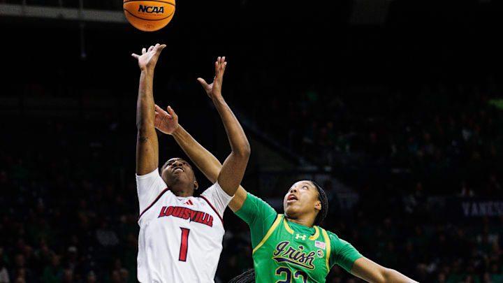 Notre Dame guard Iyana Moore (23) guards Louisville guard Reyna Scott (1) during a NCAA women's basketball game at Purcell Pavilion on Thursday, Jan. 15, 2026, in South Bend.