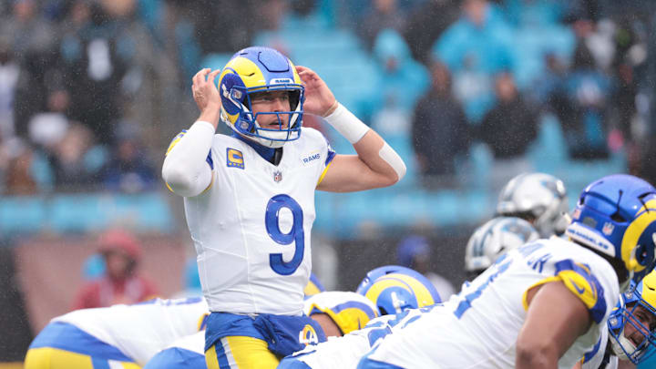 Nov 30, 2025; Charlotte, North Carolina, USA; Los Angeles Rams quarterback Matthew Stafford (9) calls a play during the fourth quarter against the Carolina Panthers at Bank of America Stadium. Mandatory Credit: Scott Kinser-Imagn Images