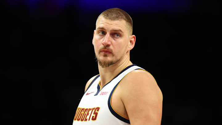Nov 29, 2025; Phoenix, Arizona, USA; Denver Nuggets center Nikola Jokic (15) against the Phoenix Suns at the Mortgage Matchup Center.