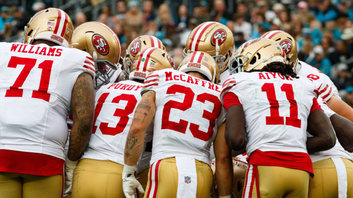 Nov 12, 2023; Jacksonville, Florida, USA; San Francisco 49ers offense huddles around quarterback Brock Purdy (13) against Jacksonville Jaguars during the second quarter at EverBank Stadium. Mandatory Credit: Morgan Tencza-USA TODAY Sports