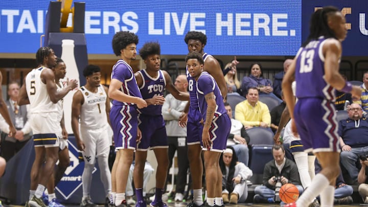 Feb 25, 2025; Morgantown, West Virginia, USA; TCU Horned Frogs players huddle during the first half against the West Virginia Mountaineers at WVU Coliseum. Mandatory Credit: Ben Queen-Imagn Images Feb 25, 2025; Morgantown, West Virginia, USA; TCU Horned Frogs players huddle during the first half against the West Virginia Mountaineers at WVU Coliseum. Mandatory Credit: Ben Queen-Imagn Images