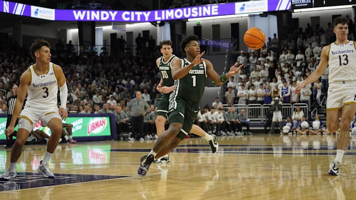Jan 12, 2025; Evanston, Illinois, USA; Michigan State Spartans guard Jeremy Fears Jr. (1) passes the ball against the Northwestern Wildcats during the first half at Welsh-Ryan Arena. Mandatory Credit: David Banks-Imagn Images
