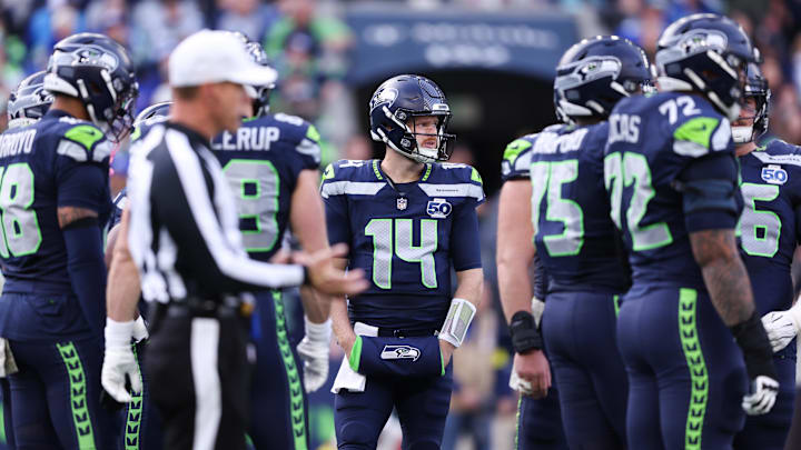 Nov 9, 2025; Seattle, Washington, USA; Seattle Seahawks quarterback Sam Darnold (14) looks on during the second quarter against the Arizona Cardinals at Lumen Field. Mandatory Credit: Kevin Ng-Imagn Images