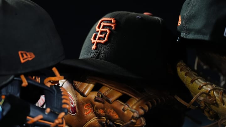 General view of San Francisco Giants caps and gloves during the sixth inning against the Colorado Rockies at Coors Field.  