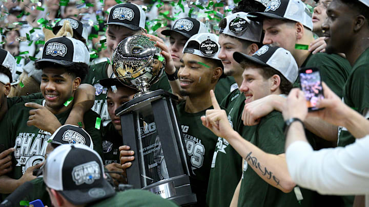 Michigan State Spartans celebrate with the Big Ten trophy 