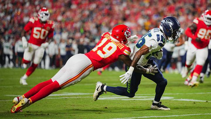 Aug 28, 2026; Kansas City, Missouri, USA; Seattle Seahawks wide receiver Ricky White III (86) runs with the ball against Kansas City Chiefs cornerback D'Arco Perkins-McAllister (19) during the second half at Arrowhead Stadium. Mandatory Credit: Jay Biggerstaff-Imagn Images