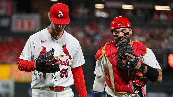 Sep 14, 2026; St. Louis, Missouri, USA; St. Louis Cardinals catcher Leo Bernal (13) talks with starting pitcher Quinn Mathews (60) as they walk off the field after the sixth inning against the San Francisco Giants at Busch Stadium. Mandatory Credit: Jeff Curry-Imagn Images