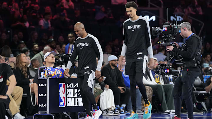 Feb 15, 2025; San Francisco, CA, USA; Team Spurs center Victor Wembanyama (1) of the San Antonio Spurs adn Team Spurs guard Chris Paul (3) of the San Antonio Spurs react after competing in the skills challenge during All Star Saturday Night ahead of the 2025 NBA All Star Game at Chase Center. Mandatory Credit: Kyle Terada-Imagn Images