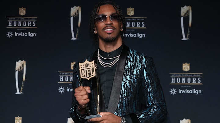 Feb 6, 2025; New Orleans, LA, USA; Washington Commanders quarterback Jayden Daniels poses with the Offensive Rookie of the Year award during Super Bowl LIX NFL Honors at Saenger Theatre. 