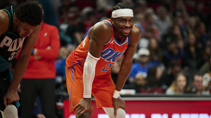 Nov 30, 2025; Portland, Oregon, USA; Oklahoma City Thunder guard Shai Gilgeous-Alexander (2) smiles at a fan during the second half in a game against the Portland Trail Blazers at Moda Center. Mandatory Credit: Troy Wayrynen-Imagn Images Nov 30, 2025; Portland, Oregon, USA; Oklahoma City Thunder guard Shai Gilgeous-Alexander (2) smiles at a fan during the second half in a game against the Portland Trail Blazers at Moda Center. Mandatory Credit: Troy Wayrynen-Imagn Images
