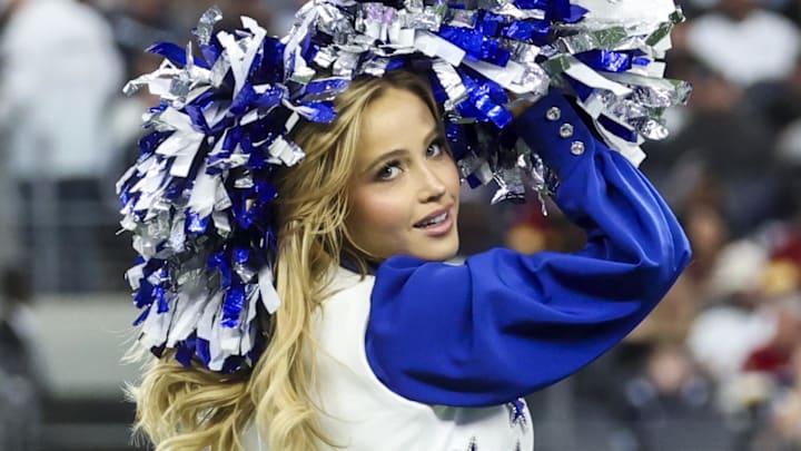 Dallas Cowboys cheerleader performs during the game against the Washington Commanders.