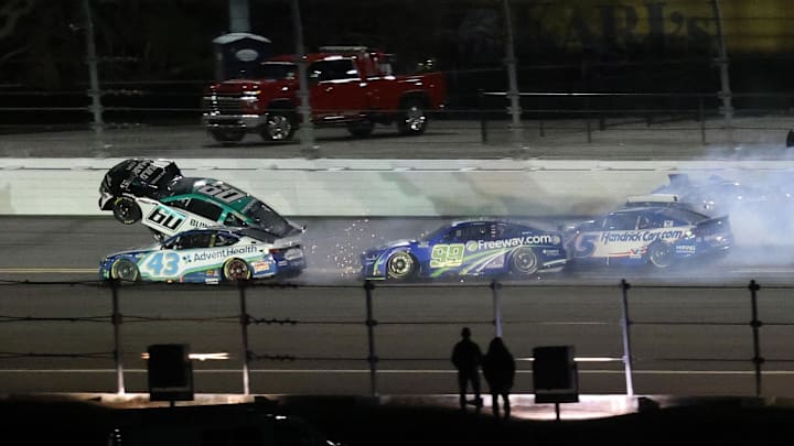 Feb 16, 2025; Daytona Beach, Florida, USA;  NASCAR Cup Series driver Ryan Preece (60) gets airborne after a wreck during the Daytona 500 at Daytona International Speedway. Mandatory Credit: Mark J. Rebilas-Imagn Images