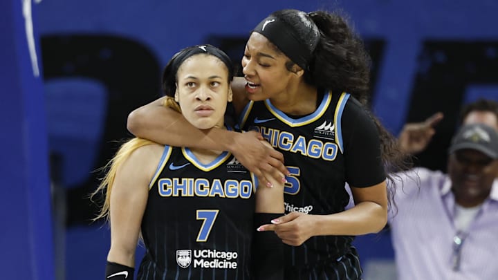Aug 25, 2024; Chicago, Illinois, USA; Chicago Sky guard Chennedy Carter (7) reacts next to forward Angel Reese (5) after scoring against the Las Vegas Aces during the second half at Wintrust Arena. Mandatory Credit: Kamil Krzaczynski-Imagn Images