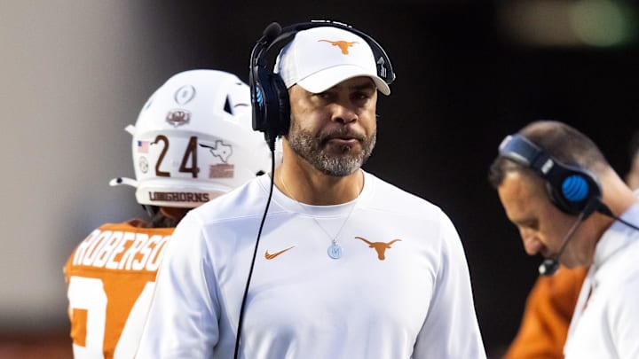 Dec 21, 2024; Austin, Texas, USA; Texas Longhorns wide receivers coach Chris Jackson against the Clemson Tigers during the CFP National playoff first round at Darrell K Royal-Texas Memorial Stadium. Mandatory Credit: Mark J. Rebilas-Imagn Images